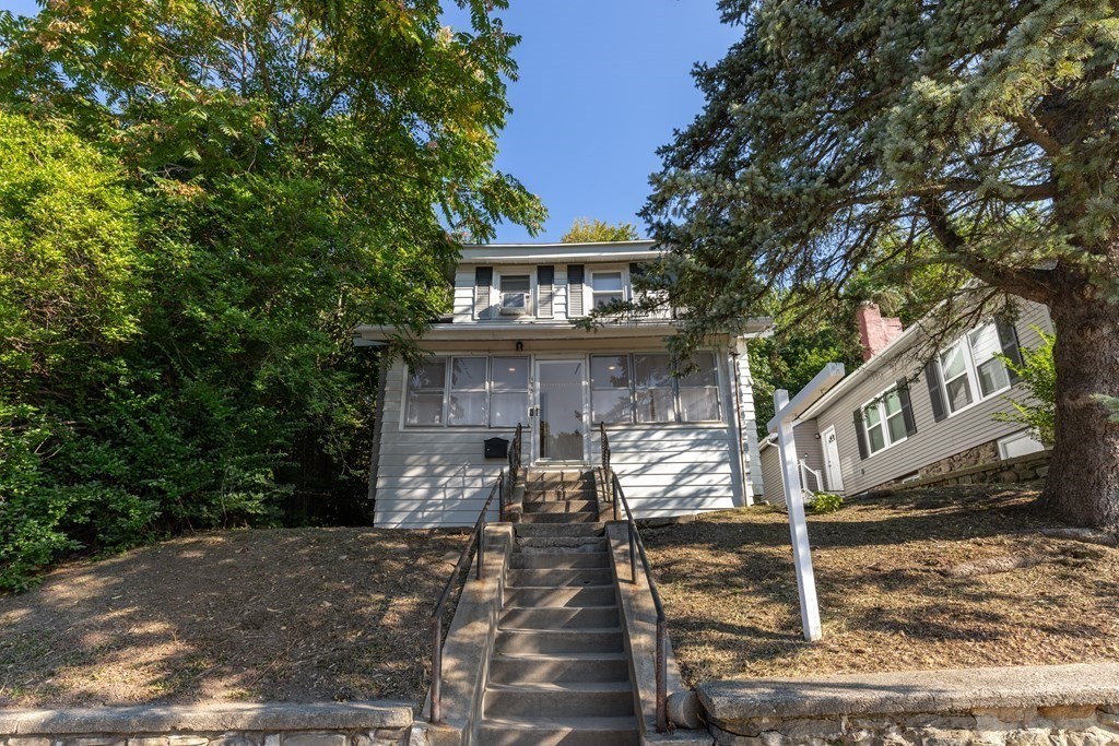 175 Hamilton Street Worcester, MA 01604 - Photo 21 of 21 a front view of a house with a tree