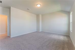 15107 Ryman Road Pflugerville, TX 78660 - Photo 12 of 34 a view of an empty room