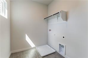 15107 Ryman Road Pflugerville, TX 78660 - Photo 15 of 34 a view of an empty walk in closet