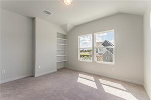 15107 Ryman Road Pflugerville, TX 78660 - Photo 16 of 34 an empty room with windows