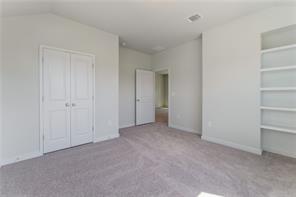 15107 Ryman Road Pflugerville, TX 78660 - Photo 17 of 34 a view of an empty room and closet area