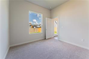 15107 Ryman Road Pflugerville, TX 78660 - Photo 26 of 34 a view of an empty room with a window