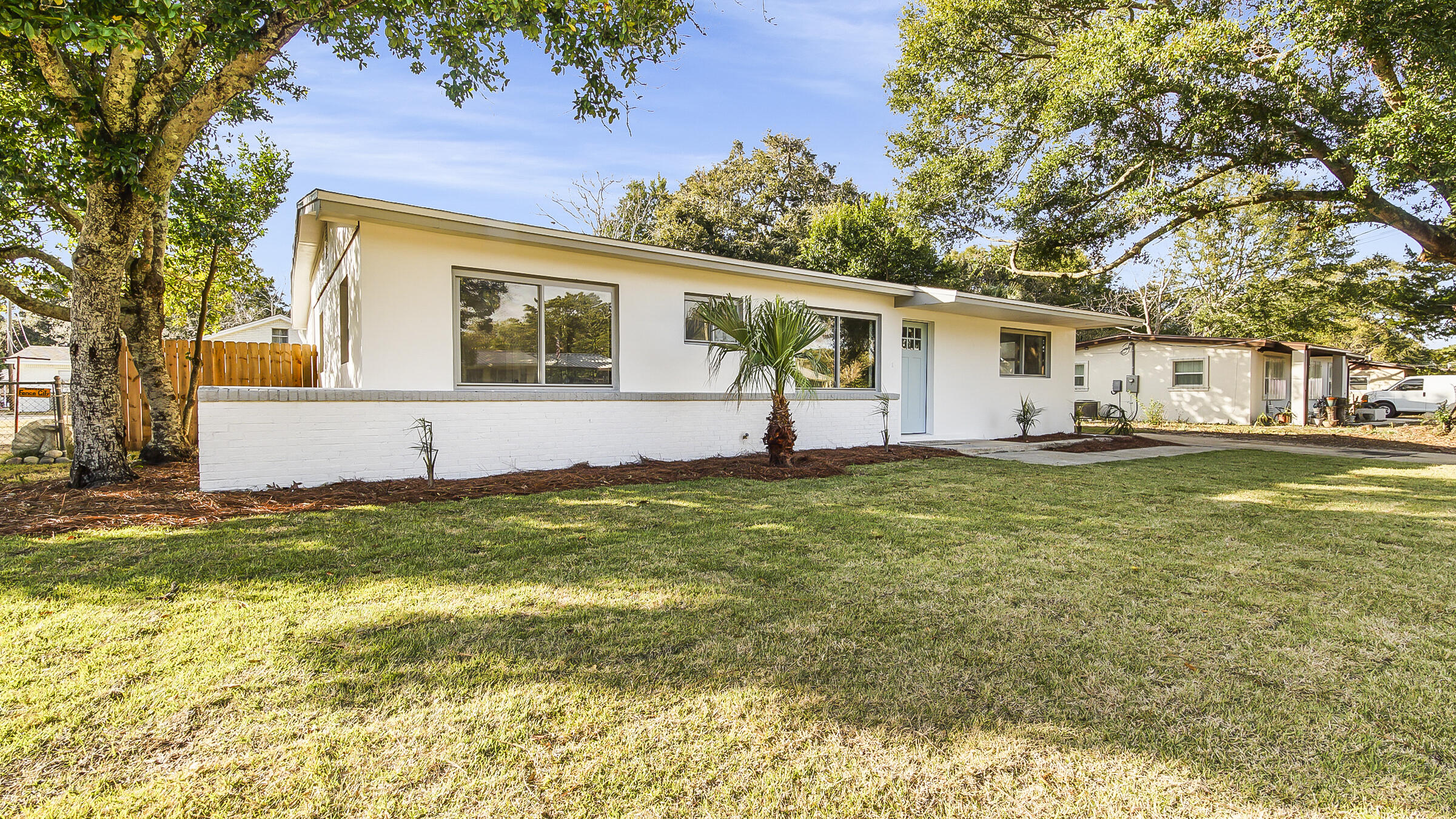 415 Avon Lane Mary Esther, FL 32569 - Photo 1 of 40 a front view of house with yard