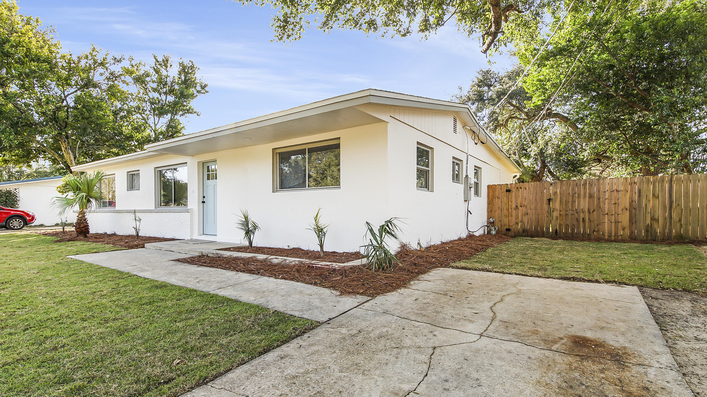 415 Avon Lane Mary Esther, FL 32569 - Photo 3 of 40 a house view with a backyard space