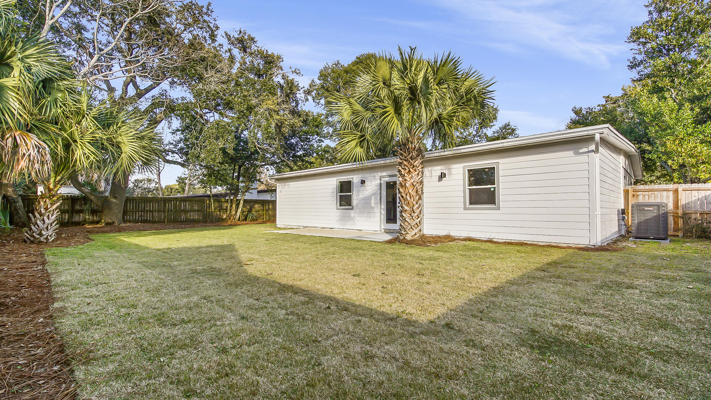 415 Avon Lane Mary Esther, FL 32569 - Photo 33 of 40 a view of a house with backyard and trees