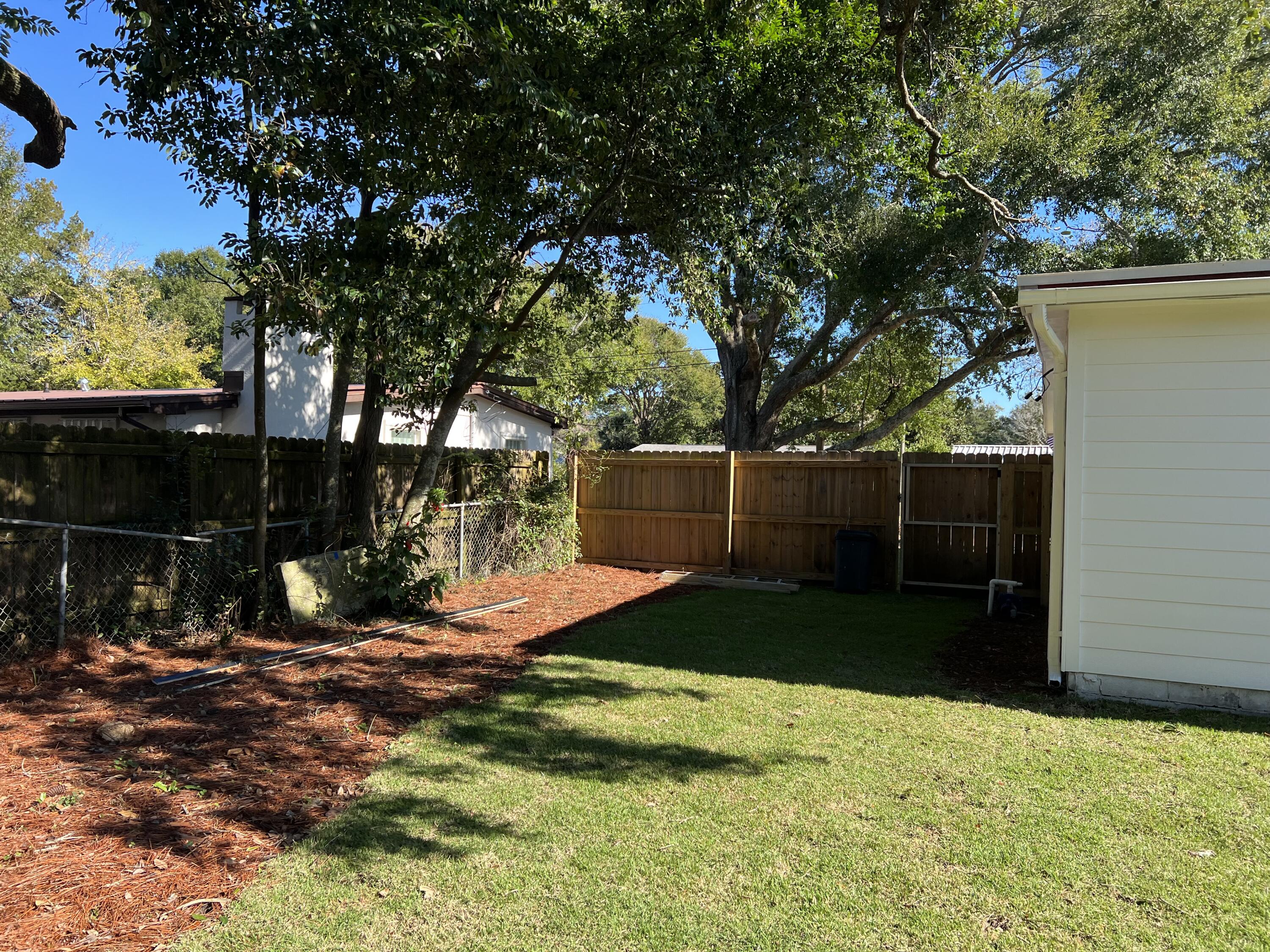 415 Avon Lane Mary Esther, FL 32569 - Photo 36 of 40 a view of backyard with green space