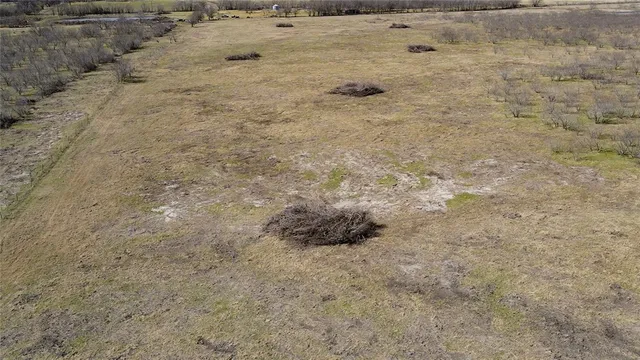 a view of a lake from a yard