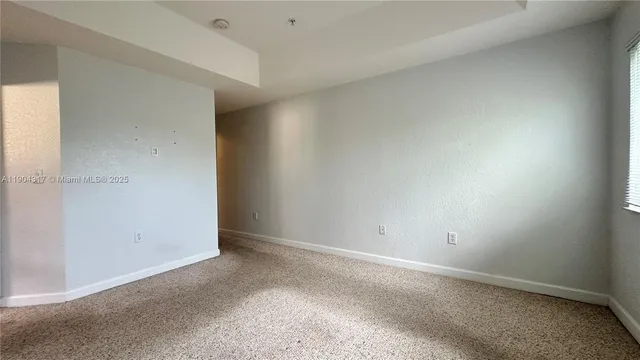 a bathroom with a bathtub shower sink vanity and toilet