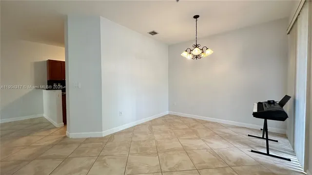 a view of a hallway view with staircase