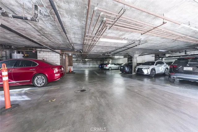 a backyard of a house with a yard and outdoor seating