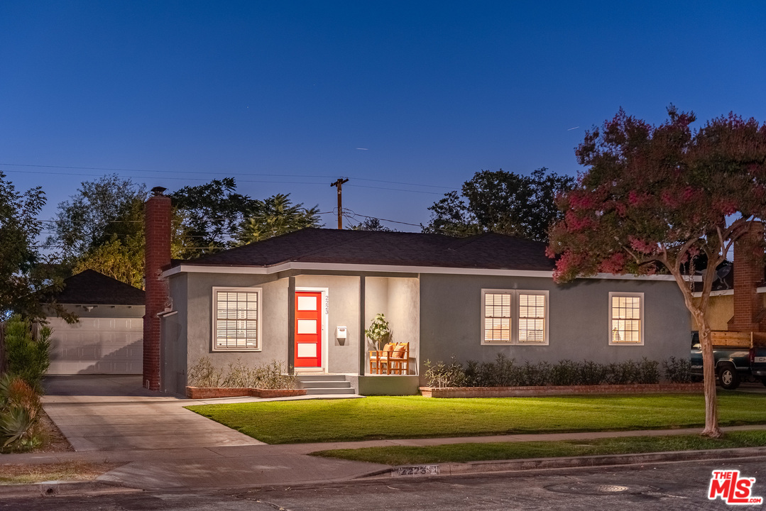 2223 North Keystone Street Burbank, CA 91504 - Photo 13 of 17 a front view of a house with a yard