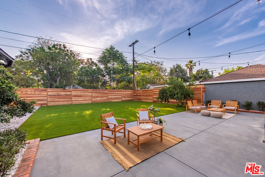 2223 North Keystone Street Burbank, CA 91504 - Photo 16 of 17 a view of a backyard with plants and a patio