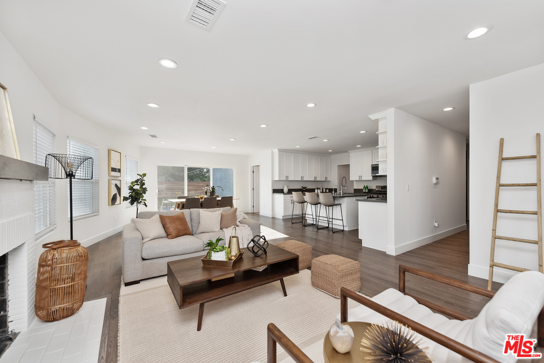 2223 North Keystone Street Burbank, CA 91504 - Photo 3 of 17 a living room with furniture and kitchen view