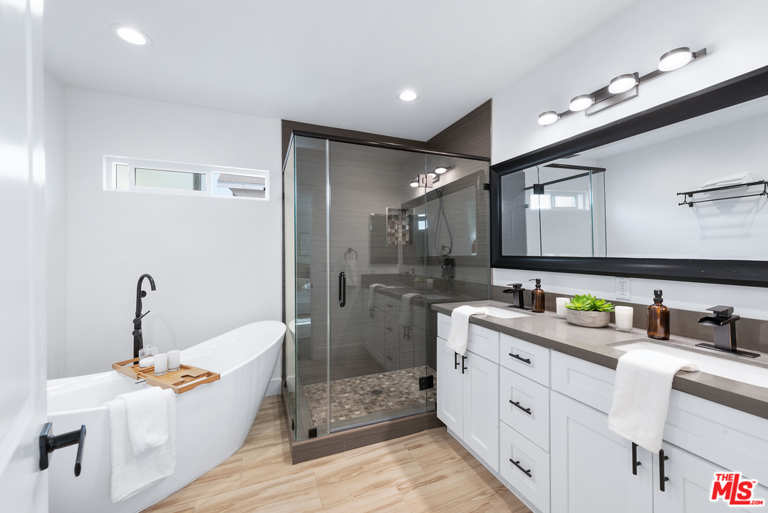 2223 North Keystone Street Burbank, CA 91504 - Photo 6 of 17 a bathroom with a double vanity sink mirror and shower