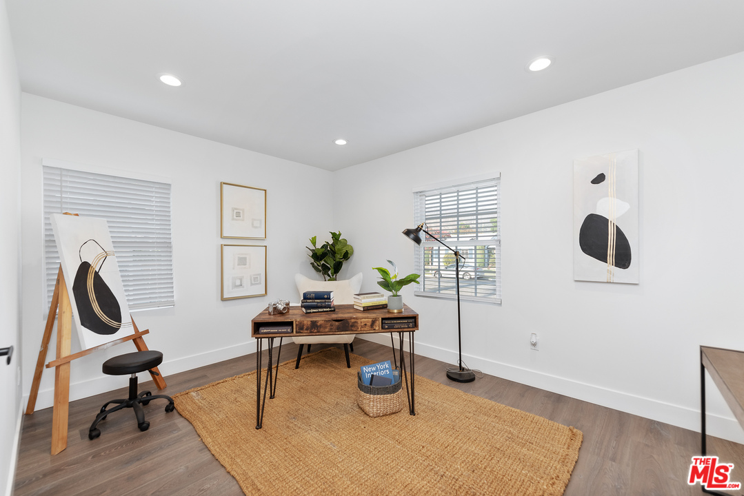 2223 North Keystone Street Burbank, CA 91504 - Photo 10 of 17 a workspace with furniture and wooden floor