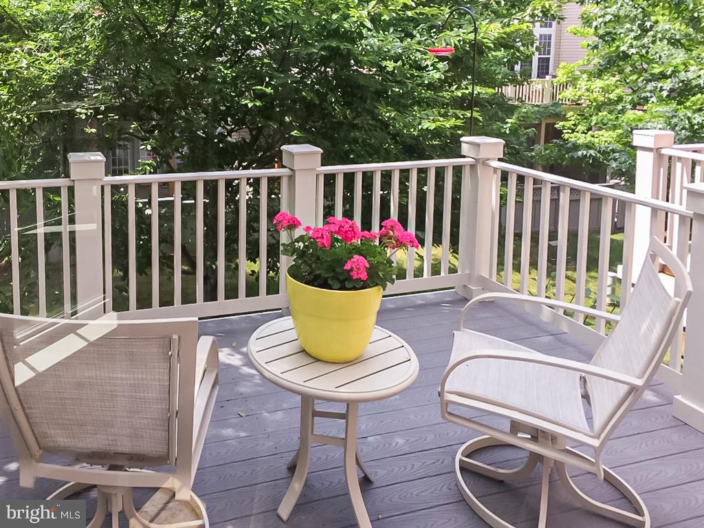 1916 Logan Manor Drive Reston, VA 20190 - Photo 15 of 56 a view of a chairs and table in the patio