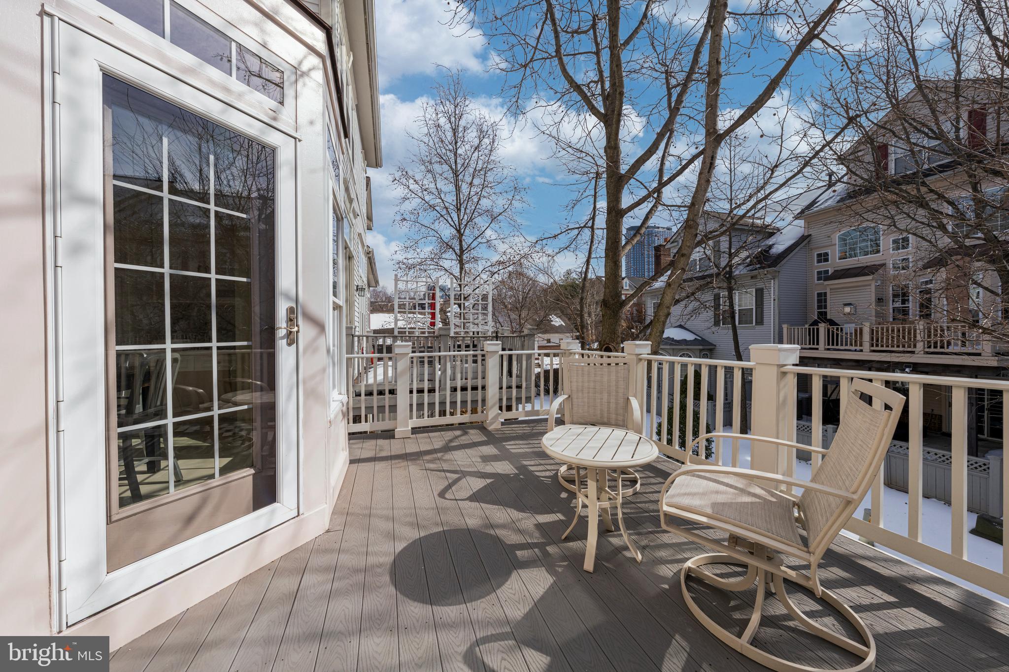 1916 Logan Manor Drive Reston, VA 20190 - Photo 16 of 56 a view of a chair and table in the balcony