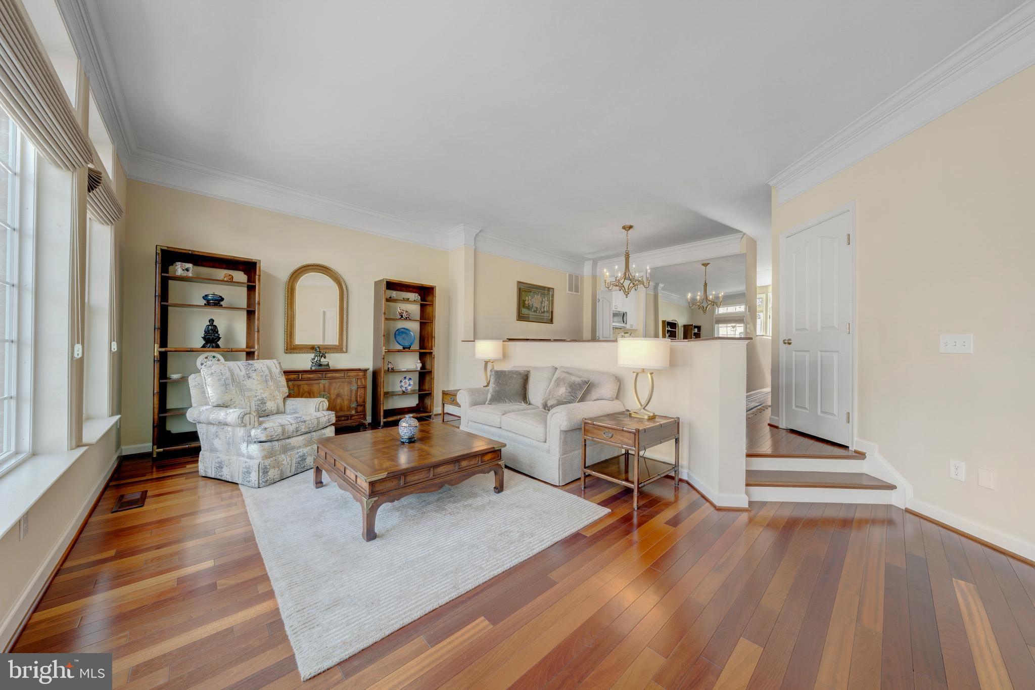 1916 Logan Manor Drive Reston, VA 20190 - Photo 3 of 56 a living room with furniture and a wooden floor