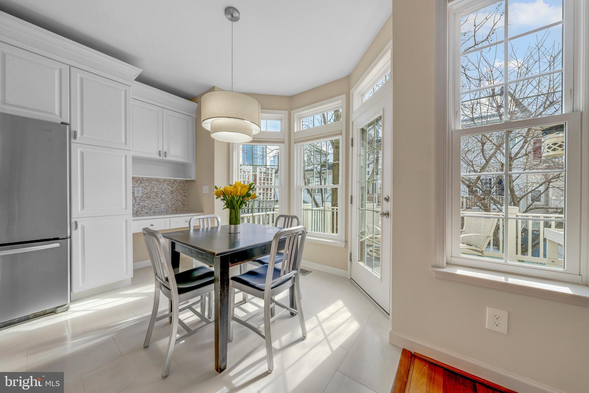 1916 Logan Manor Drive Reston, VA 20190 - Photo 38 of 56 a view of a dining room with furniture window and outside view