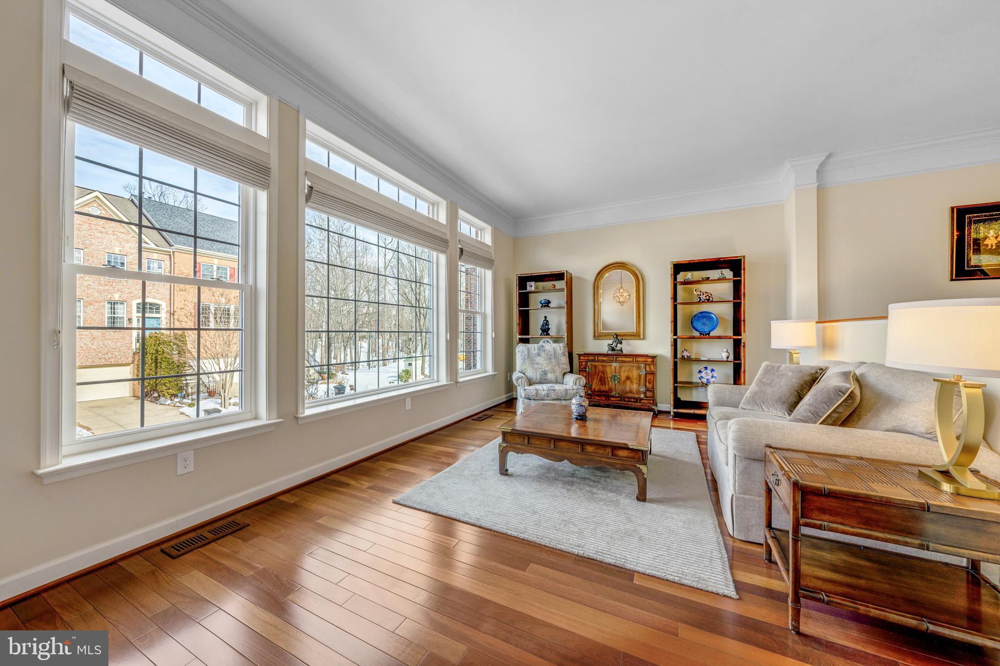 1916 Logan Manor Drive Reston, VA 20190 - Photo 39 of 56 a living room with furniture and a window