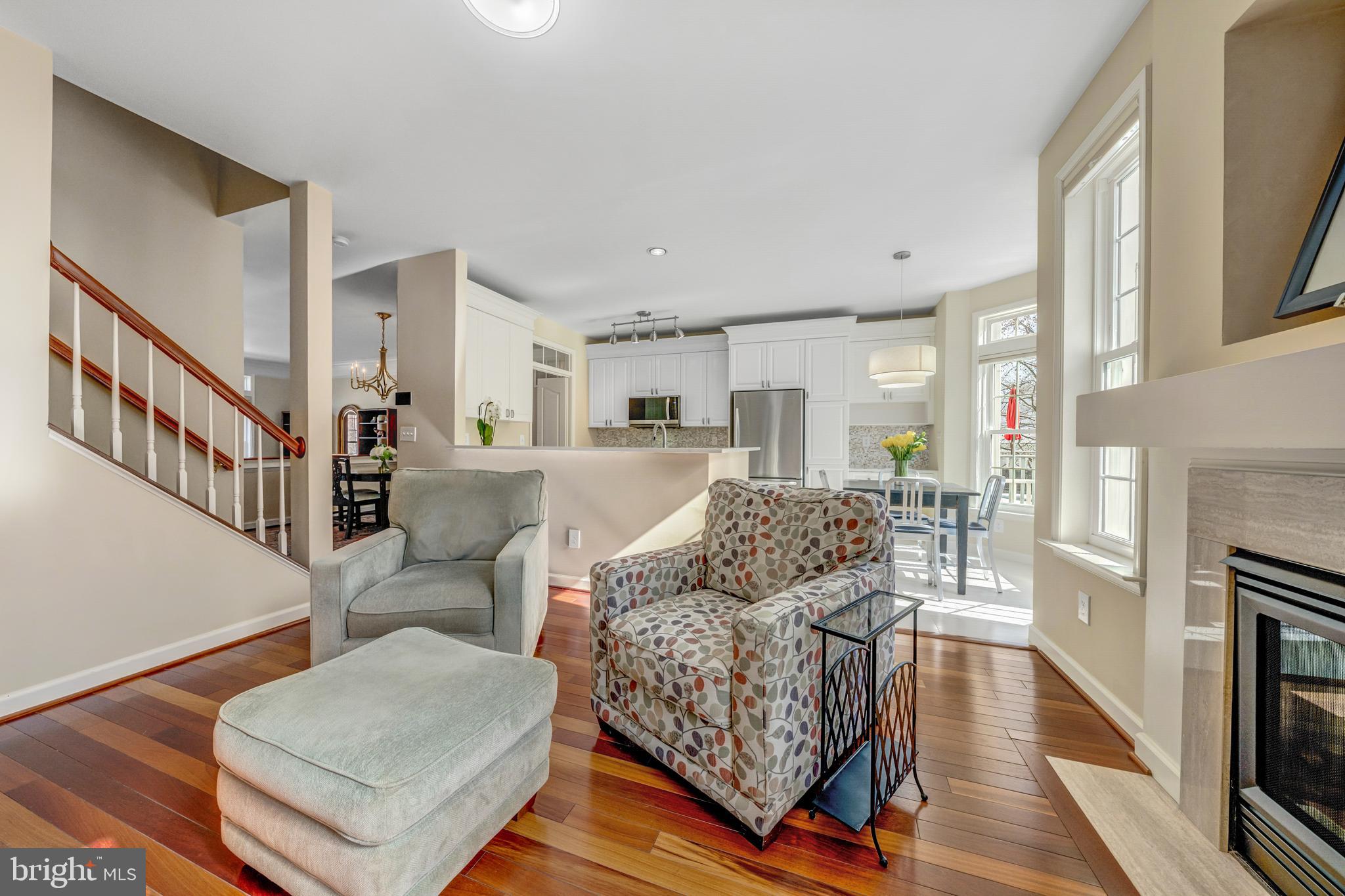1916 Logan Manor Drive Reston, VA 20190 - Photo 41 of 56 a living room with furniture and a fireplace