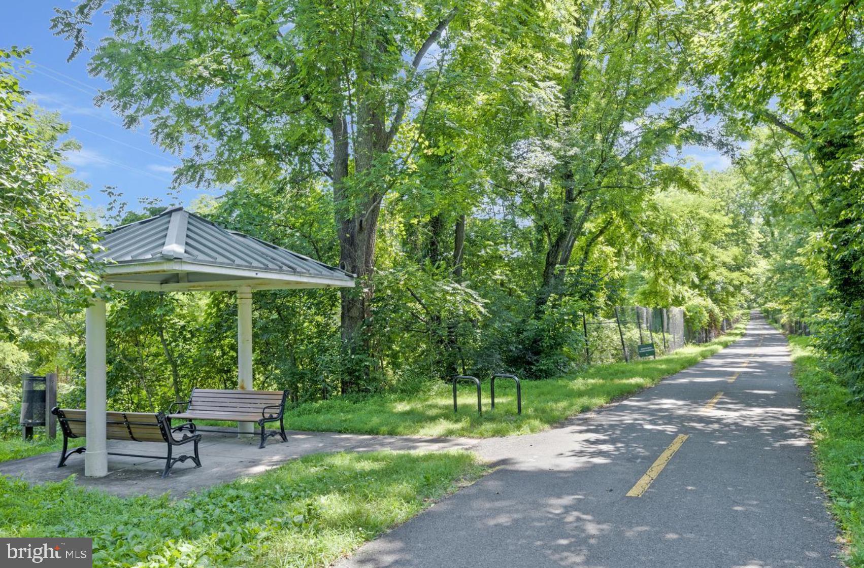 1916 Logan Manor Drive Reston, VA 20190 - Photo 52 of 56 a view of a bench in a garden