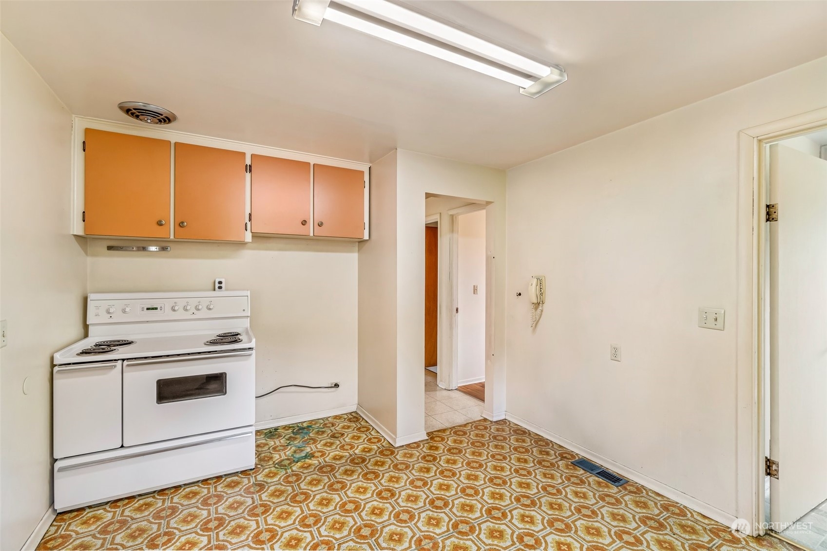 24324 7th Avenue West Bothell, WA 98021 - Photo 16 of 40 a kitchen with a stove and a refrigerator