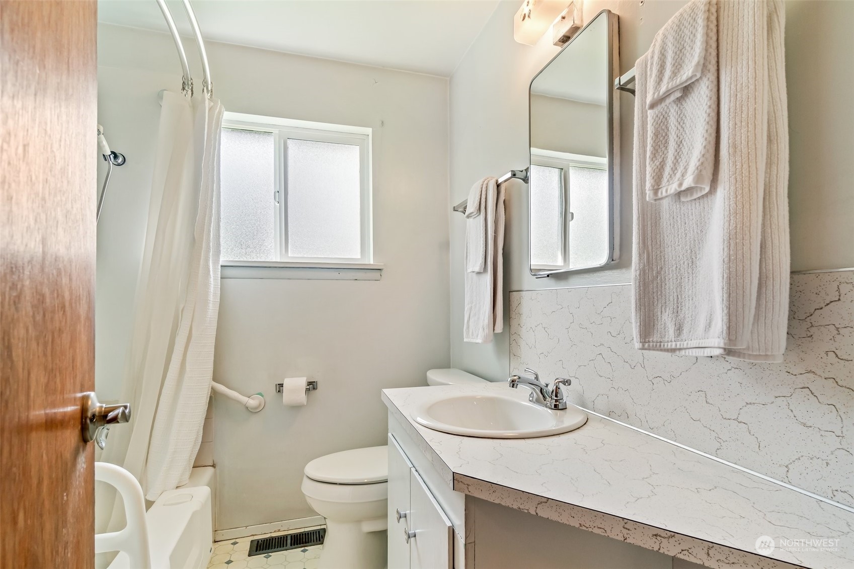 24324 7th Avenue West Bothell, WA 98021 - Photo 18 of 40 a bathroom with a sink and a toilet