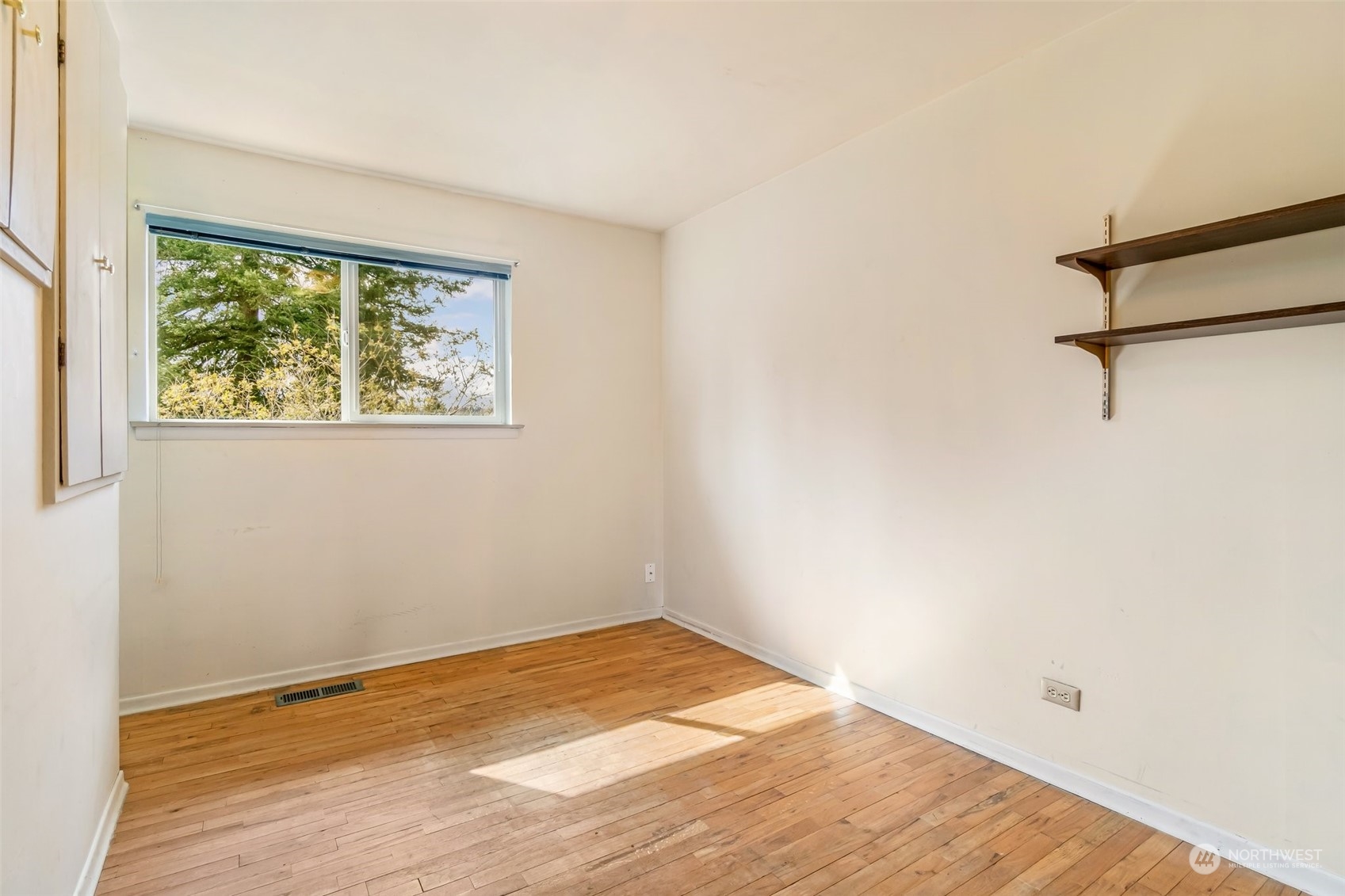 24324 7th Avenue West Bothell, WA 98021 - Photo 19 of 40 an empty room with a window