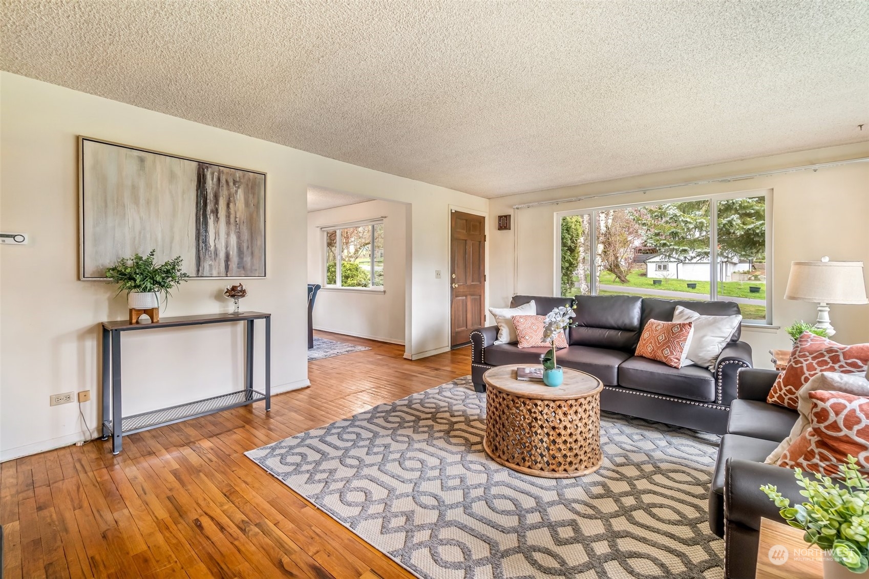 24324 7th Avenue West Bothell, WA 98021 - Photo 9 of 40 a living room with furniture rug and window