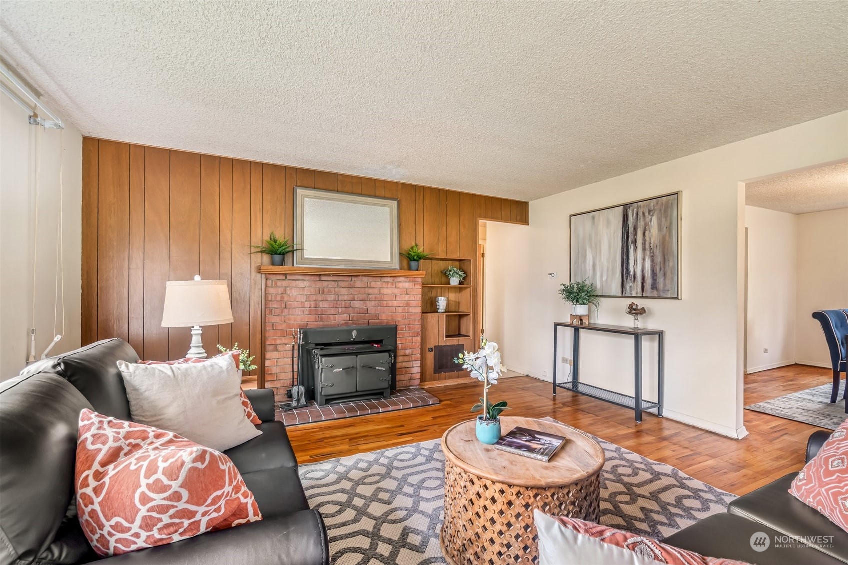 24324 7th Avenue West Bothell, WA 98021 - Photo 10 of 40 a living room with furniture and a fireplace