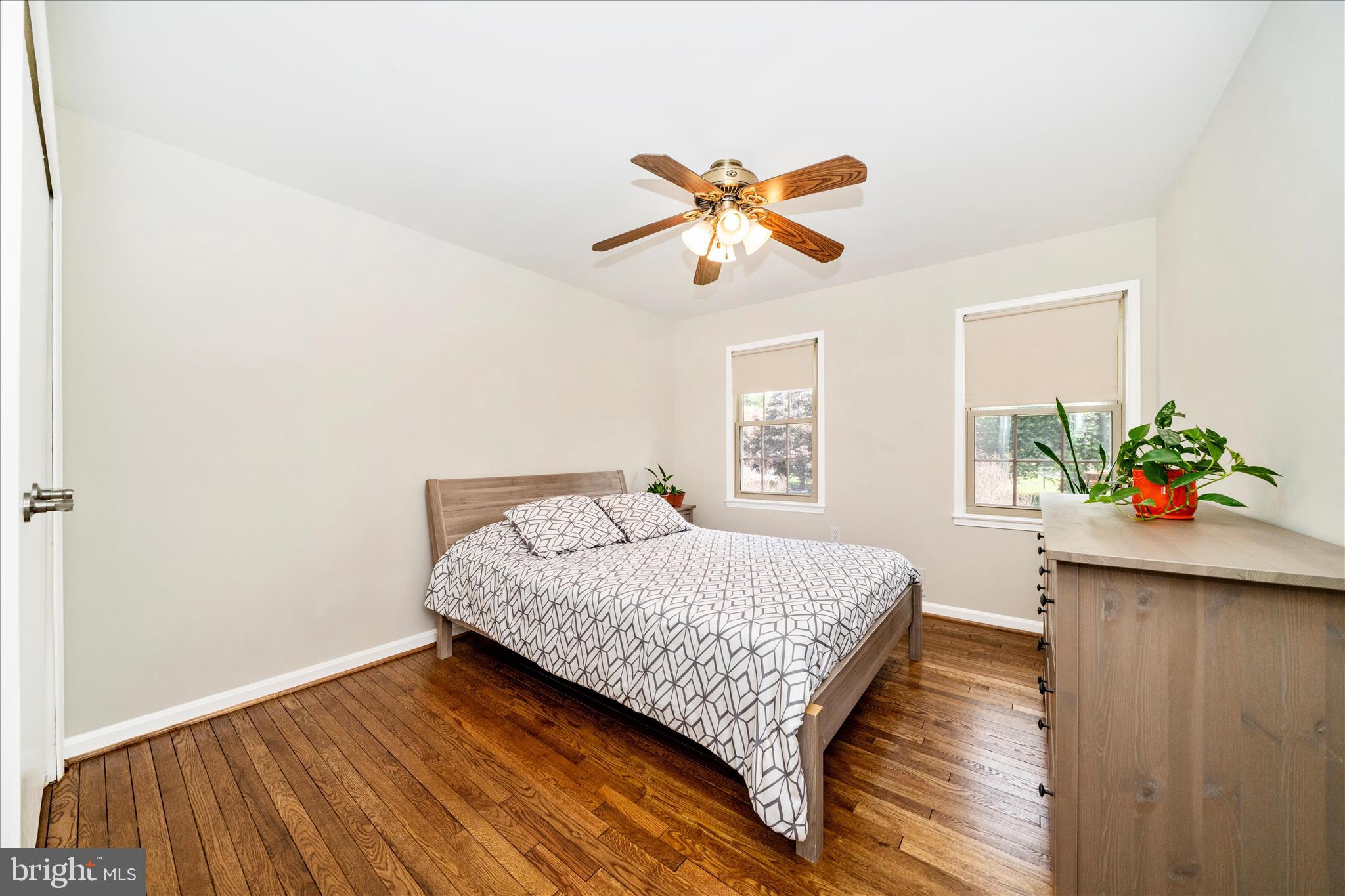 16000 Narrows Terrace Silver Spring, MD 20906 - Photo 30 of 54 a bedroom with a bed and a window