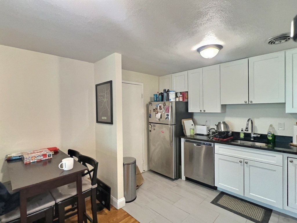217 Kent Street, Unit 11 Brookline, MA 02446 - Photo 1 of 11