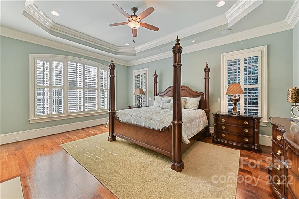 1951 Harris Road Charlotte, NC 28211 - Photo 13 of 35 a bedroom with a bed dresser and a window