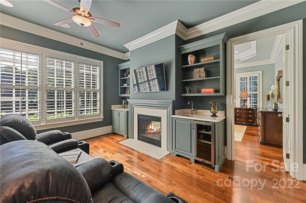 1951 Harris Road Charlotte, NC 28211 - Photo 14 of 35 a living room with furniture and a fireplace