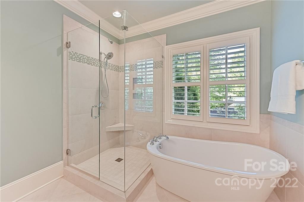 1951 Harris Road Charlotte, NC 28211 - Photo 24 of 35 a white bath tub sitting next to a shower