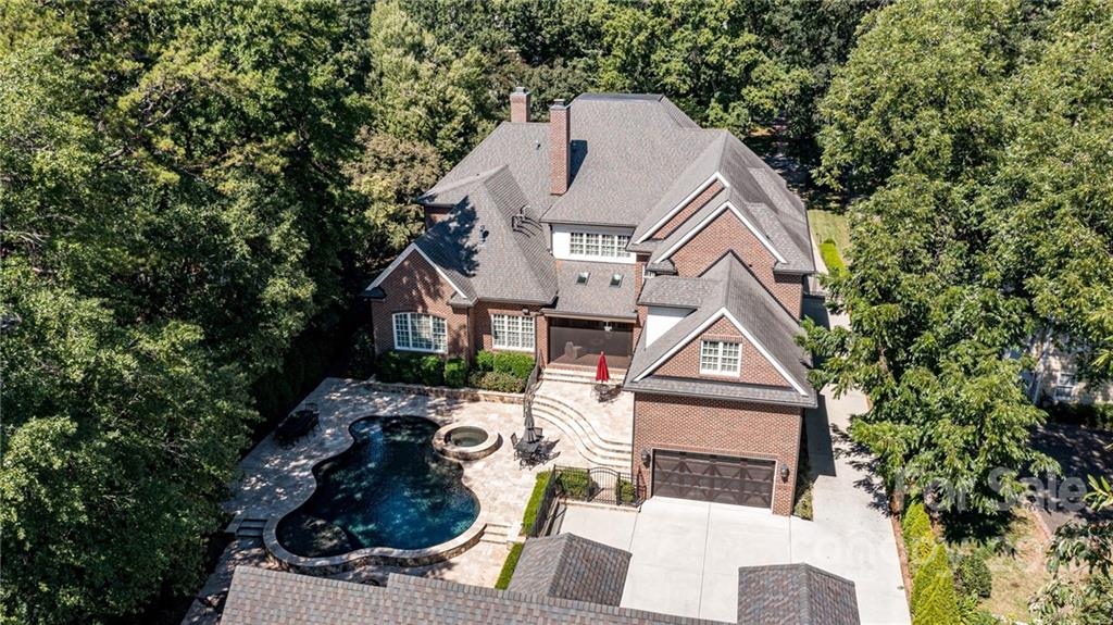 1951 Harris Road Charlotte, NC 28211 - Photo 3 of 35 a house with trees in front of it
