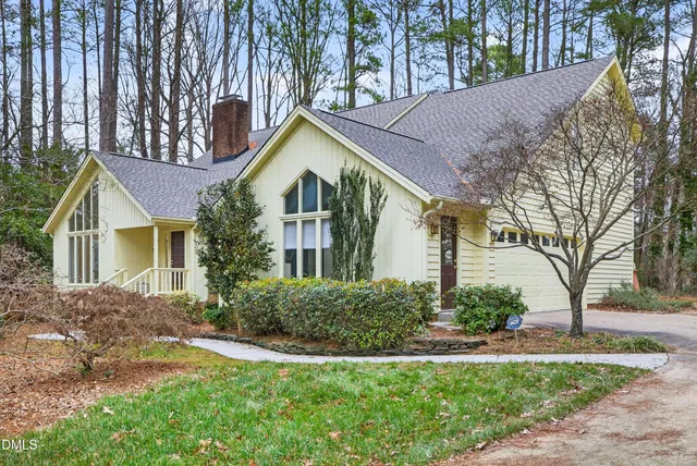 a view of a yard in front of a house
