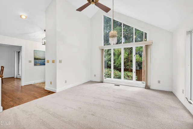 a hallway with sink and potted plant