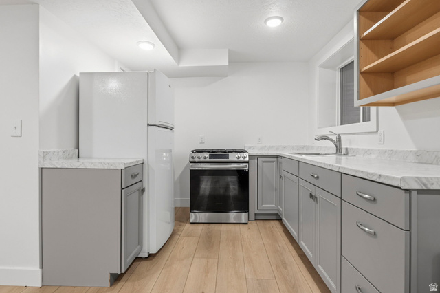 4150 Dover Lane Provo, UT 84604 - Photo 28 of 44 Kitchen featuring light wood-finish flooring and recessed lighting