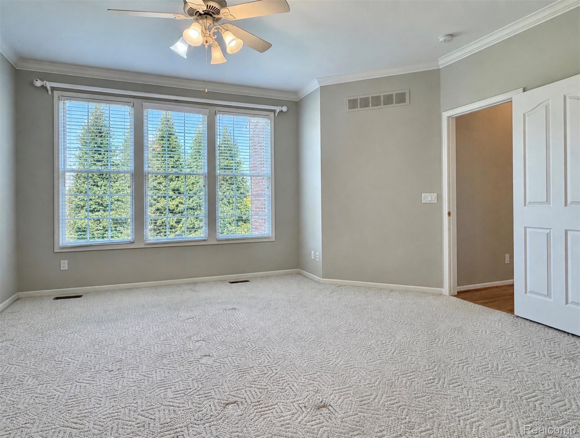 1627 Boulder Court Rochester, MI 48306 - Photo 16 of 44 Main floor primary suite