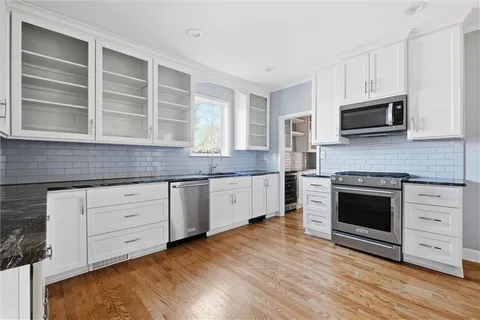 $890,000 | 5701 Central Street, Kansas City, MO 64113