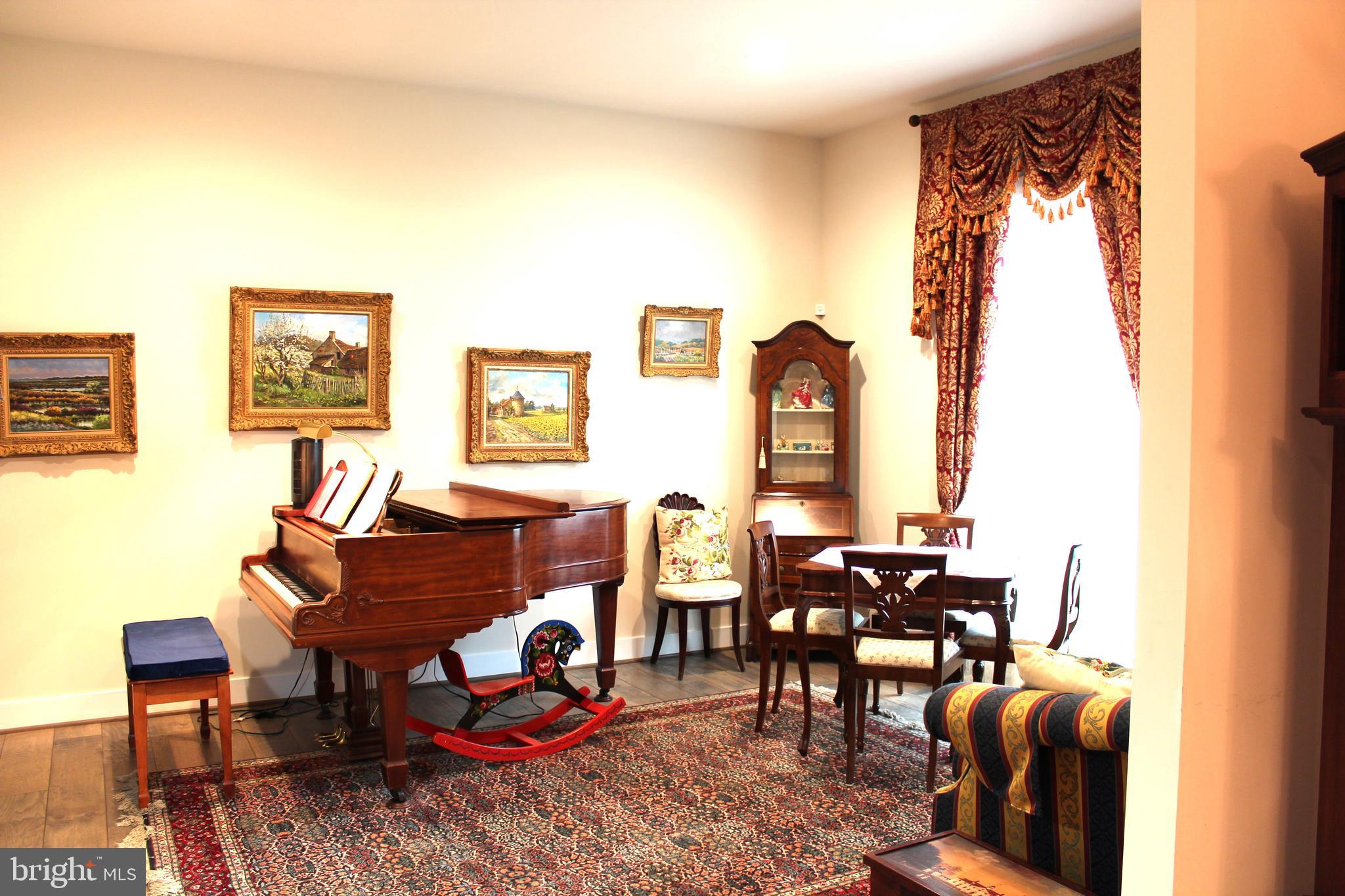 2342 Courthouse Road Stafford, VA 22554 - Photo 12 of 66 a living room with furniture and wooden floor