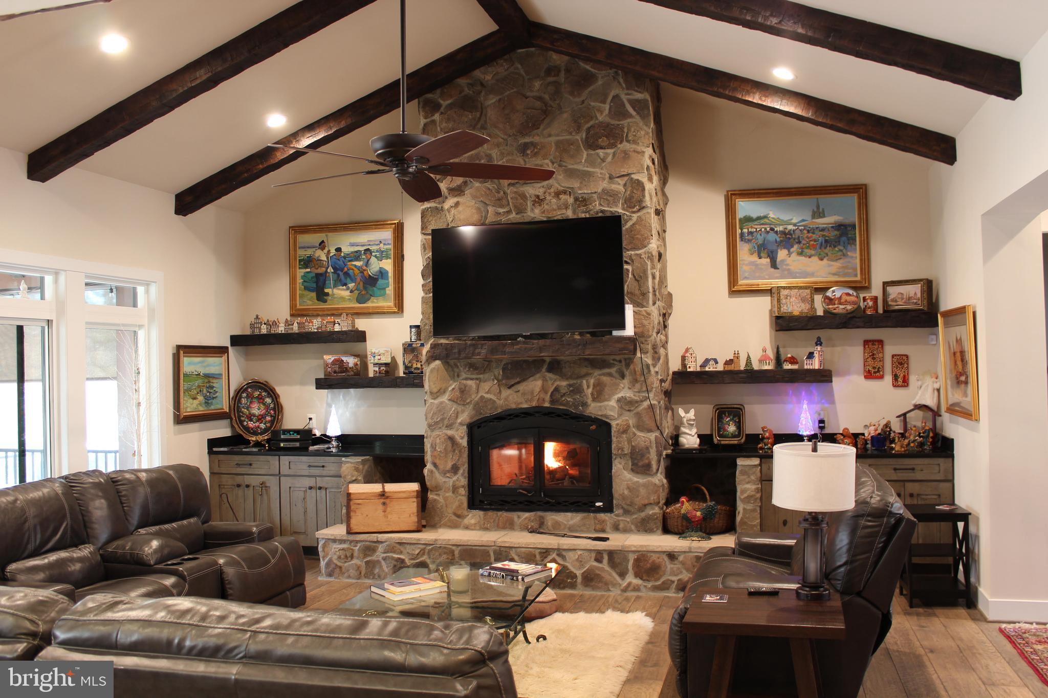 2342 Courthouse Road Stafford, VA 22554 - Photo 18 of 66 a living room with furniture and a fireplace