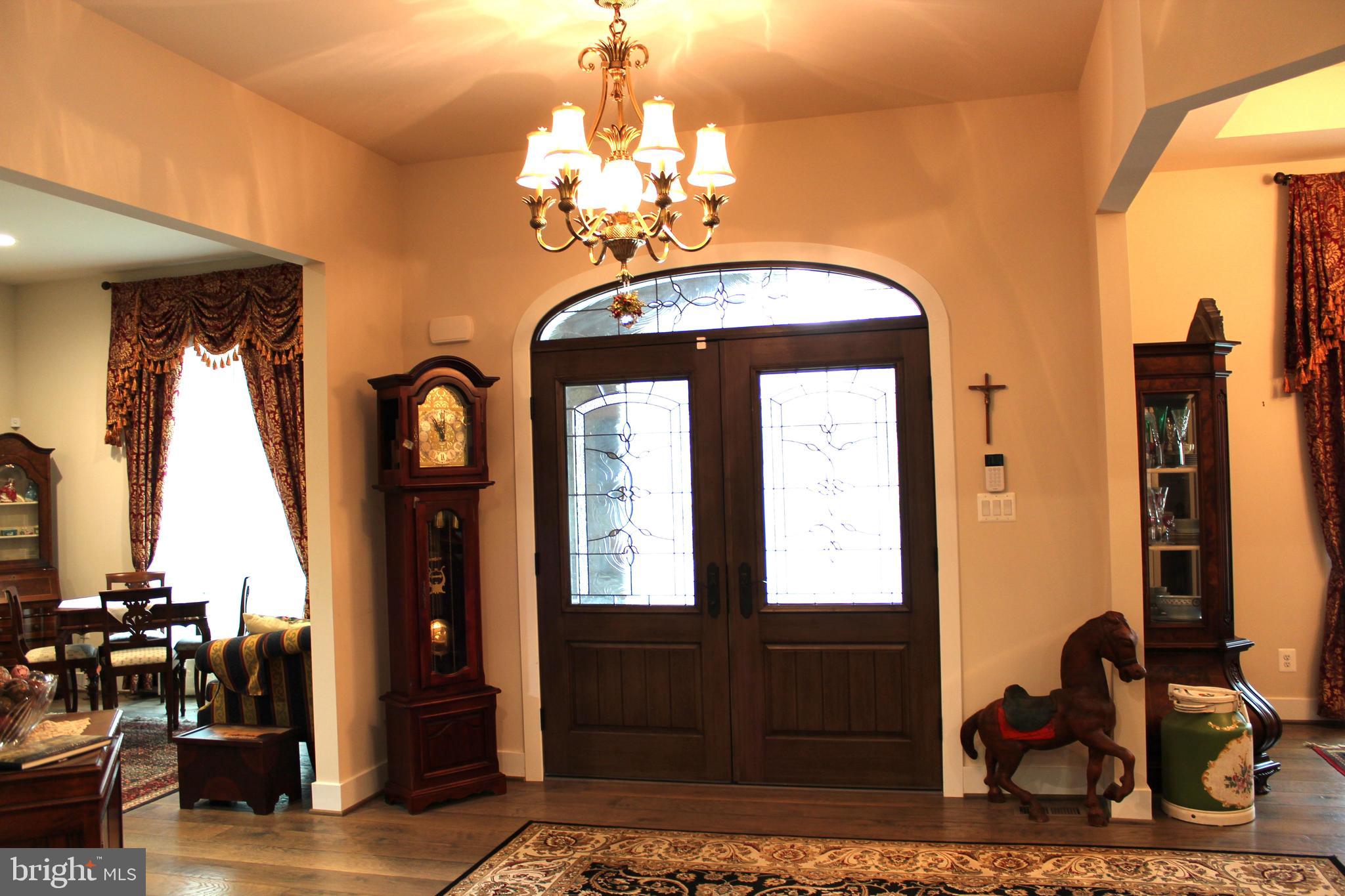 2342 Courthouse Road Stafford, VA 22554 - Photo 5 of 66 a view of a entryway door of the house and living room