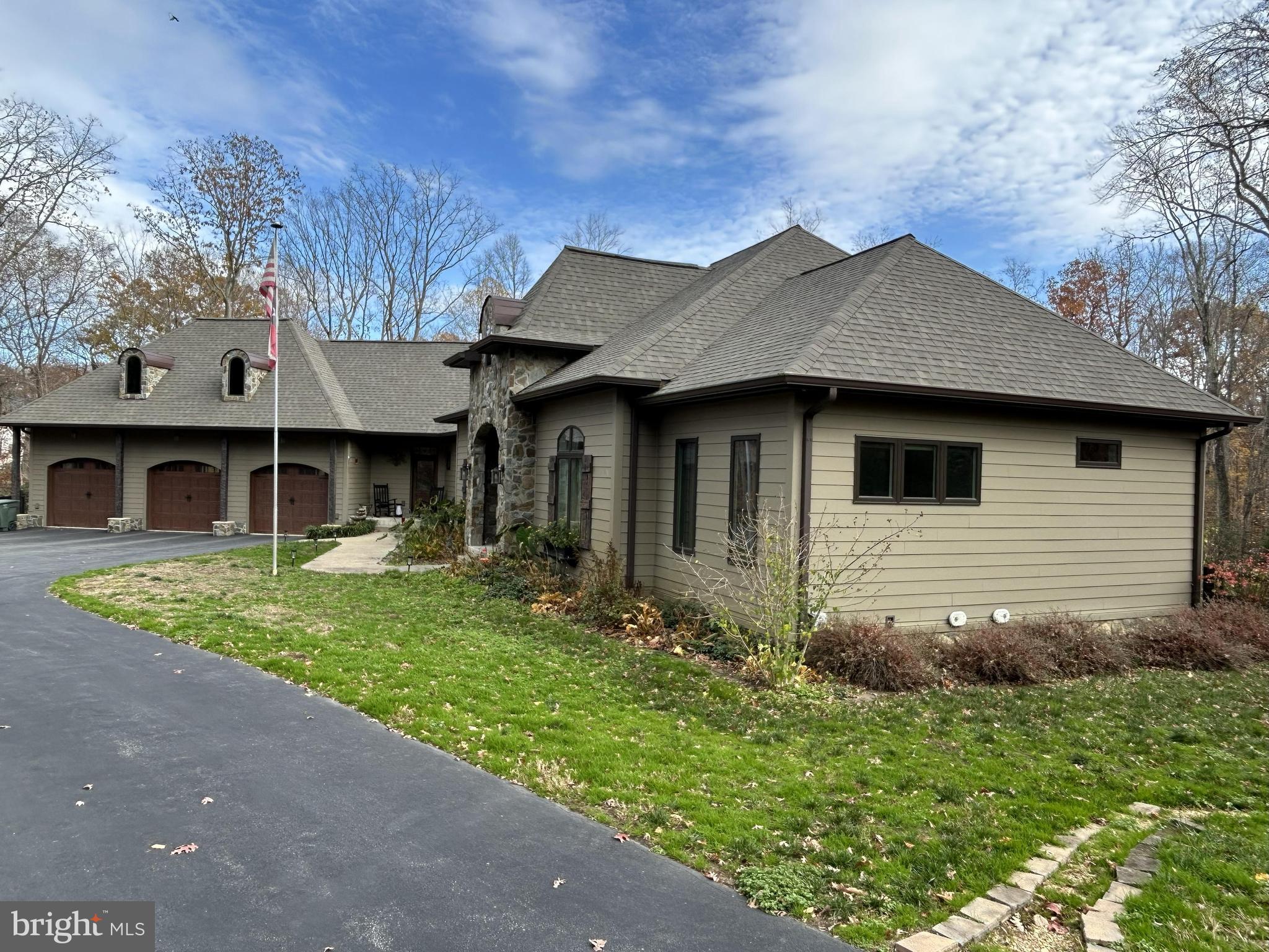 2342 Courthouse Road Stafford, VA 22554 - Photo 58 of 66 a view of a house with a yard plants and large tree
