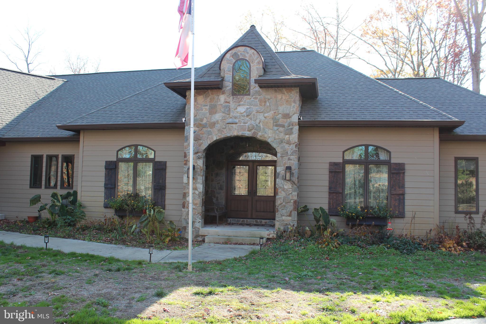 2342 Courthouse Road Stafford, VA 22554 - Photo 62 of 66 a front view of a house with garden