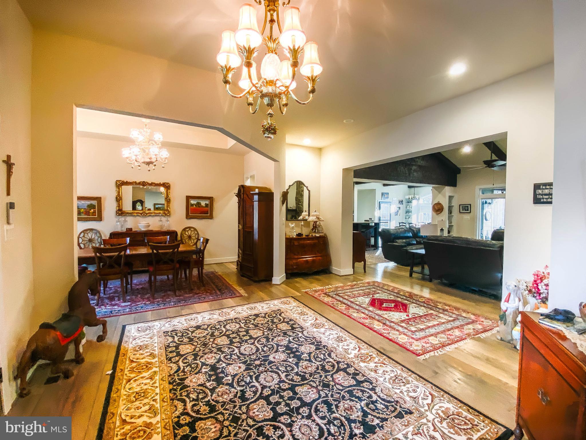 2342 Courthouse Road Stafford, VA 22554 - Photo 9 of 66 a living room with furniture and a chandelier