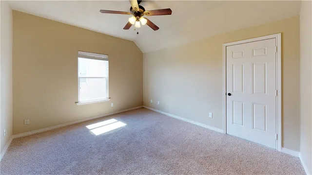 a view of empty room with windows