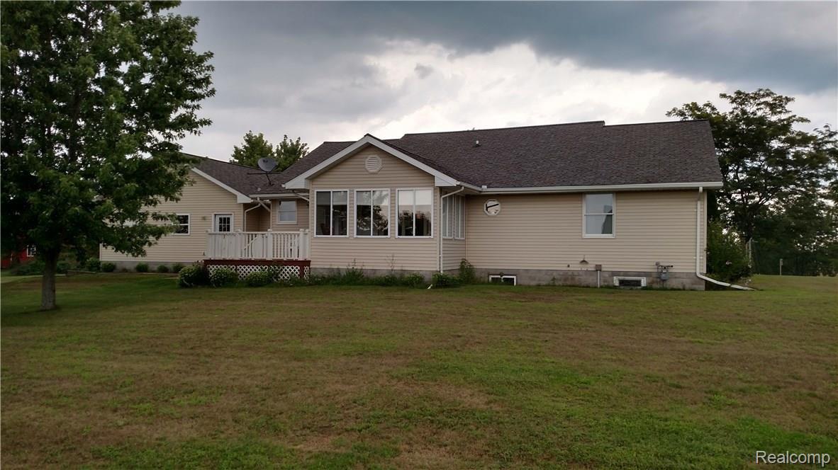 5984 Brockway Road Peck, MI 48466 - Photo 20 of 24 This is a view of the back of the home.